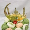 Eid Kage topper i guldplast